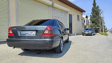 spoiler satisi: Mercedes-Benz C 200: 2 l | 1995 il Sedan — 2
