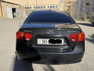 Hyundai: Hyundai Elantra sedan - Korpus: 4 qapılı sedan, qara rəng - Mühərrik — 4