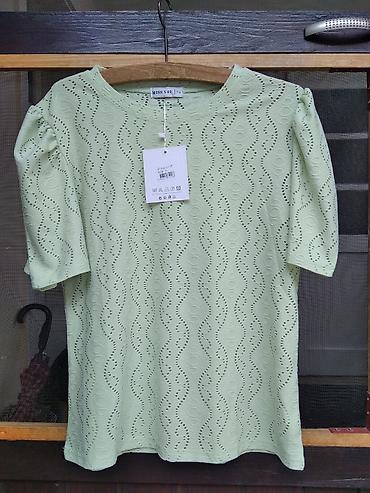 odece: Bluza vel. TU u novom stanju. To je univerzalna velicina za velicina — 2