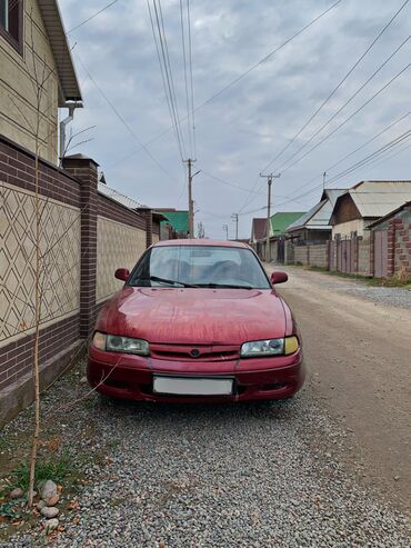 Транспорт: Mazda 626: 1992 г., 2 л, Механика, Бензин, Седан