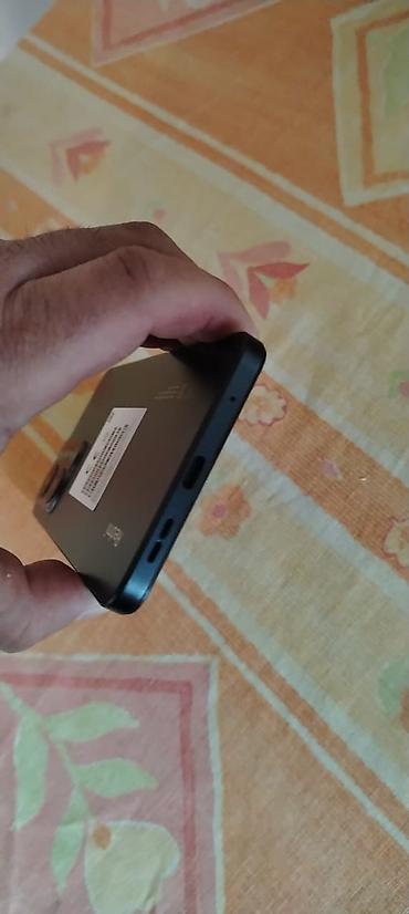 Redmi: Xiaomi Redmi Note 12 (görsellərdə) - Ekran: 6.67" AMOLED, mərkəzi — 10