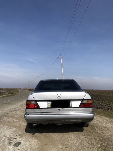 2 yas yarim usagin cekisi: Mercedes-Benz E 230: 2.3 l | 1991 il Sedan