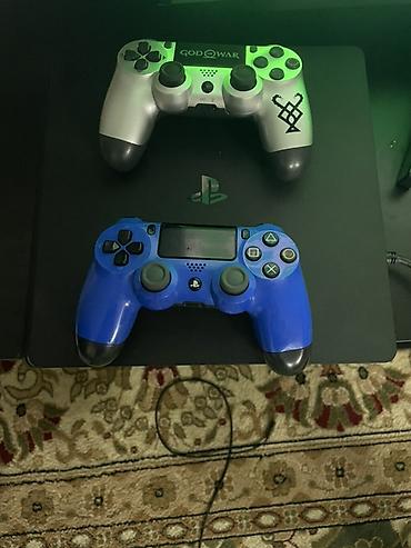 Игровая консоль Sony PlayStation 4 Slim (черная) с двумя фирменными — 1