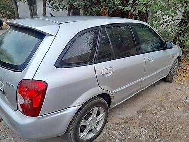 2 8: Mazda 323: 2003 г., 1.6 л, Механика, Бензин, Седан — 3