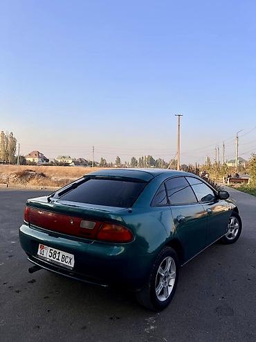 баткенге жардам: Mazda 323: 1995 г., 1.8 л, Кол менен иштөөчү, Бензин, Седан — 4