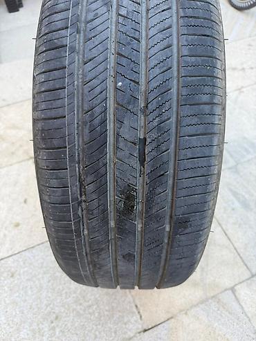 orta panel: İşlənmiş Şin Goodride 235 / 45 / R 19 — 2