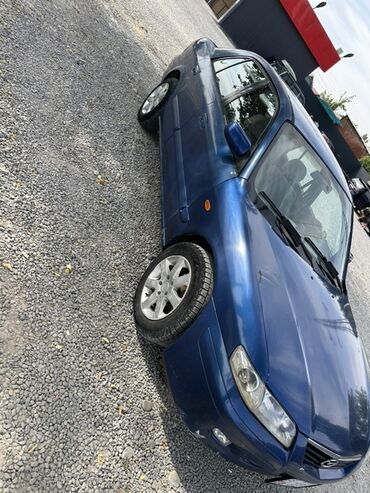Mazda 626: 2000 г., Седан