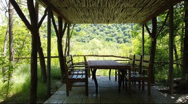 Kommersiya daşınmaz əmlakının satışı: Qusar şəhərində(200 sot) Şahdağa gedən yolun Qusar çayının sol — 5