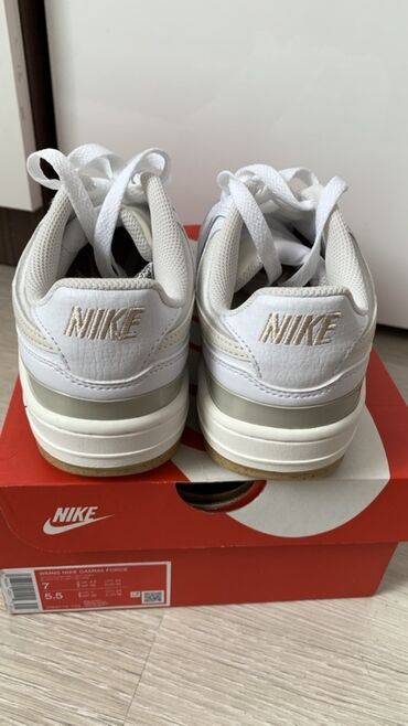 женская одежда бишкек оптом и в розницу: Белые кроссовки Nike Court Vision Low с кожаным верхом и логотипом