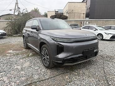dodg ram: GAC Trumpchi / S7 (эмблема GAC), серый SUV. 2025 год максимальная — 2