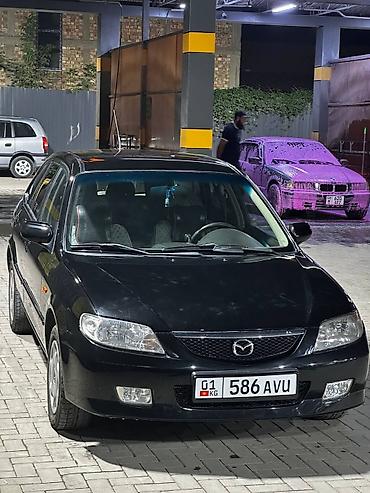 Mazda: Mazda 323: 2001 г., 1.6 л, Механика, Бензин, Седан — 10