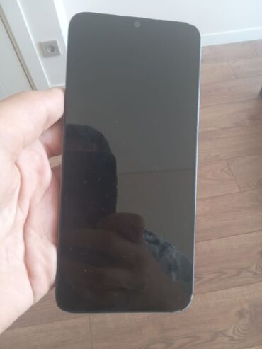 telefon ekran şəkilləri: Honor X6a, 128 GB, rəng - Mavi, Barmaq izi, İki sim kartlı, Face ID