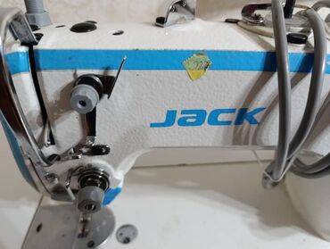 аксы шивений машинка: Тигүүчү машина Jack, Автомат