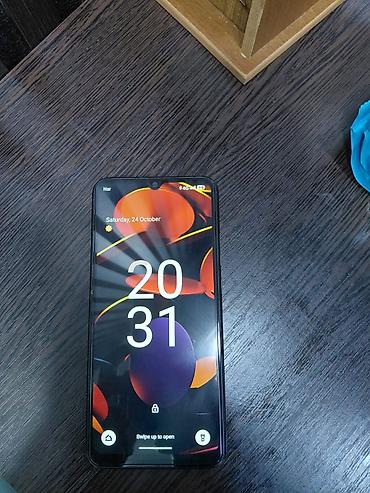 redmi qulaqciq: Xiaomi Redmi (A seriyası) smartfon - Rəng: qara, mat teksturalı arxa — 5