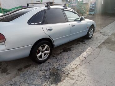 mazda 3: Mazda Cronos: 1993 г., 2 л, Механика, Бензин, Хэтчбэк