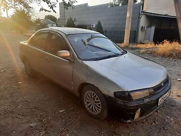 Транспорт: Mazda 323: 1997 г., 1.6 л, Автомат, Бензин — 1