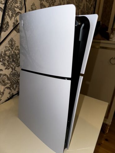 сколько стоит playstation 4: PlayStation 5 Slim (diskli versiya) oyun konsolu + 18 Əfsanəvi oyunla