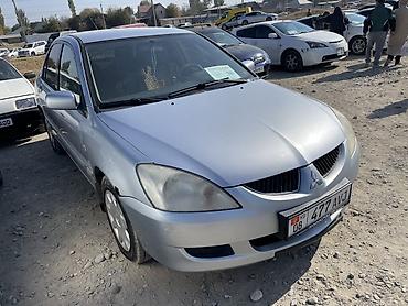 сузуки лиано: Mitsubishi Lancer: 2004 г., Автомат, Бензин, Седан — 2