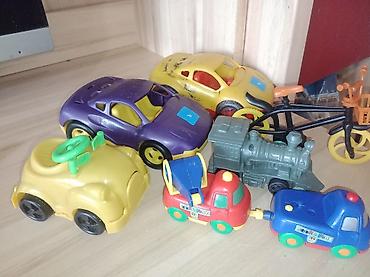 Игрушки: Набор игрушечных транспортных средств Состав: - Большой автовоз с — 13