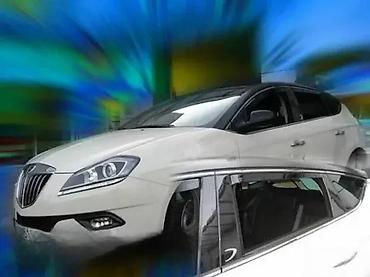 Ostali delovi karoserije: BOCNI VETROBRANI DEFLEKTORI USMERIVACI LANCIA DELTA (08-14) | NOVI — 4
