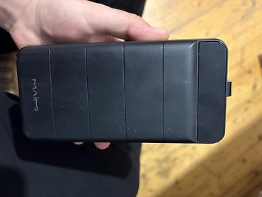 sud ceken: MAIMI 50000 mAh Powerbank Xüsusiyyətlər: - Tutum: 50.000 mAh (185 Wh — 6
