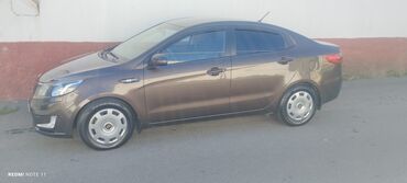 Kia: Kia Rio sedan - Korpus: 4 qapılı sedan, tünd qəhvəyi rəng - Kuzov — 12