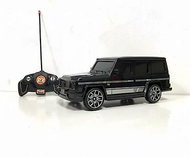 Игрушки: Радиоуправляемая модель внедорожника в стиле Mercedes G-Class — 1