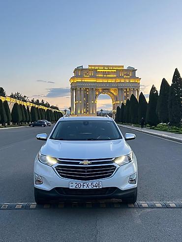 şevralet equinox: Chevrolet Equinox – ağ rəngli, şəhər və uzun yol üçün rahat krossover — 1
