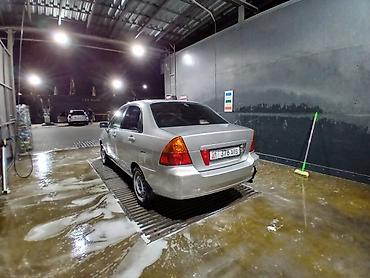 даихатсу сирион: Suzuki Liana: 2003 г. — 2