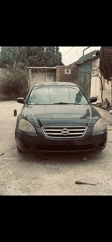 accent 2005: Nissan Altima: 2.5 l | 2005 il Sedan — 4