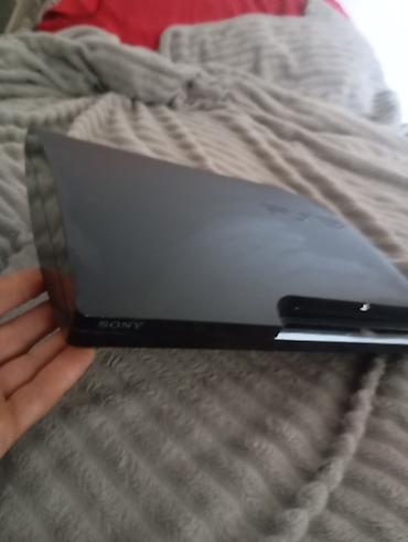 pls 3: Игровая консоль Sony PlayStation 3 (Super Slim) с двумя беспроводными — 2
