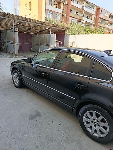 vaz hisseleri: Volkswagen Passat sedan – qara rəng, AZ nömrə nişanı “90 LB 105” — 6