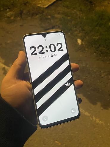 Уюлдук телефондор жана аксессуарлар: Смартфон с экраном около 6–6.5", каплевидный вырез под фронтальную — 1