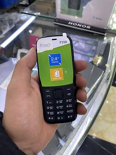 tab 9: Кнопочный мобильный телефон F+ F256 - Экран 2.4" - Поддержка двух — 1