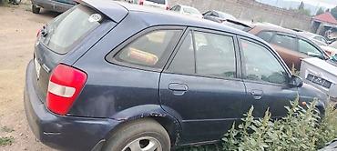 кажы сай: Mazda 323: 2001 г., 1.6 л, Кол менен иштөөчү, Бензин, Универсал — 6