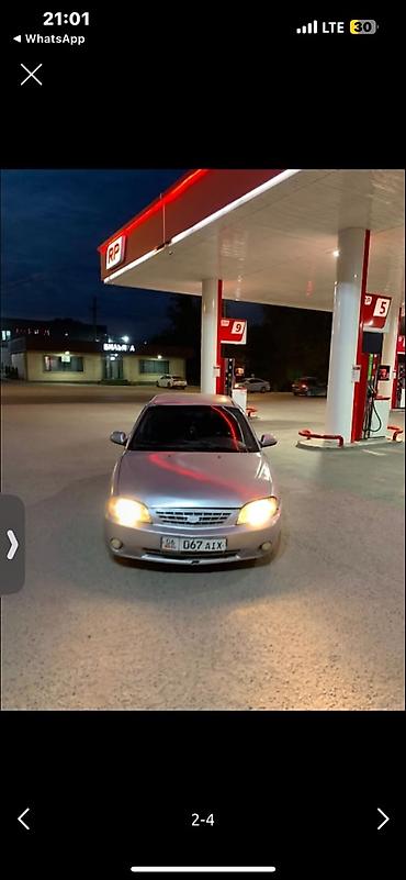 mazda 626 1989: Kia Spectra: 2003 г., 1.5 л, Автомат, Бензин, Седан — 3