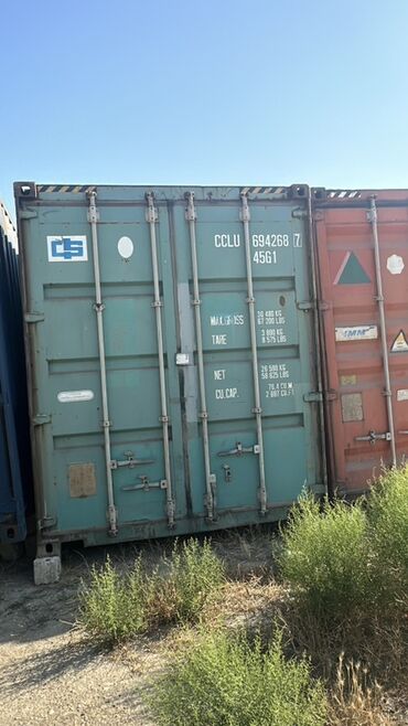 hazır evler konteyner: Yaşıl rəngdə, 4561 seriyalı CCLU markalı konteyner. Yük daşımaları və