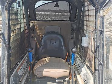 mini yer sumlayan: Bobcat S175.
İş saatı -2843.5 — 3