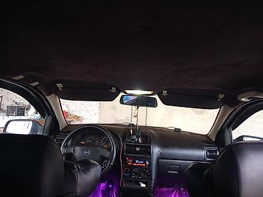 tap az opel vectra: Opel Astra универсал kuzovlu minik avtomobil. Rəngi tünd qırmızı — 6