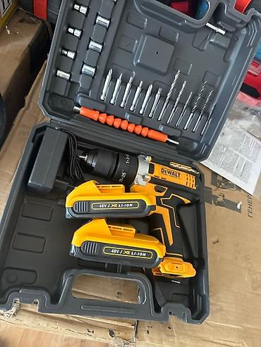 dewalt dcd794d1: Ударная дрель-шуруповерт DeWalt, поставляемая в комплекте с двумя — 2