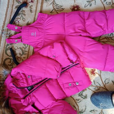 зимние одежда: Продается зимний фирменный комбинезон на девочку. фирма Богнер, размер