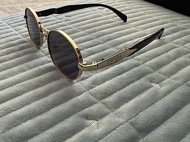 Продаю элегантные солнцезащитные очки Prada (модель PR 65ZS) в