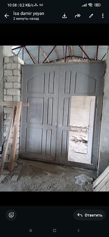 daş soba: İkiqat metal darvaza Eni 2.4 hündürlüyü 3 metrə darvaza daxili anbarda — 2