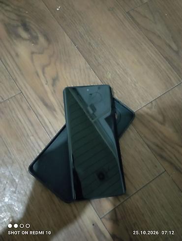 tecno spark: Смартфон POCO (серия M, 5G). Корпус чёрный, в комплекте виден защитный — 6