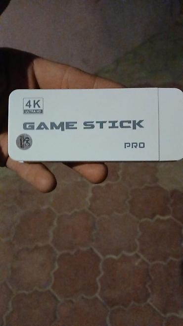 asus rog ally x: Game Stick Pro – TV-yə qoşulan mini oyun konsolu - 4K Ultra HD çıxış — 1