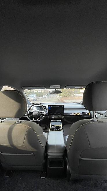 GAC: Электромобиль GAC Aion Y (белый, 5‑дверный кроссовер/MPV городского — 12