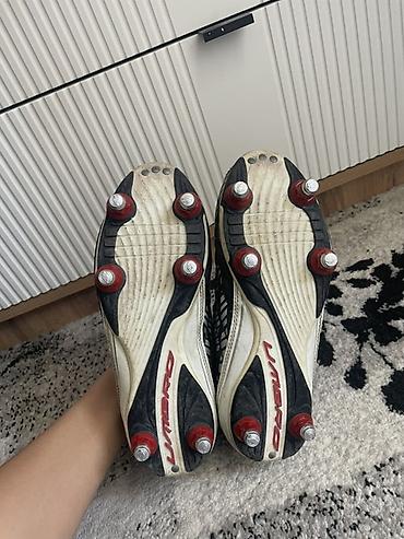 sg: Футбольные бутсы Umbro с металлическими шипами. Классическая модель — 1