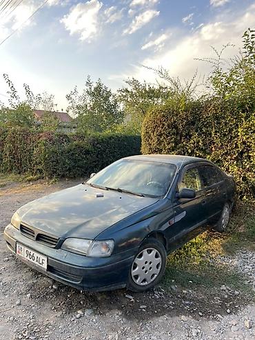Toyota Carina E: 1996 г., 1.8 л, Механика, Бензин, Седан