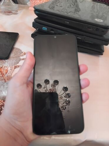 balaca telefon: Xiaomi 64 ГБ, цвет - Черный, 
 Две SIM карты