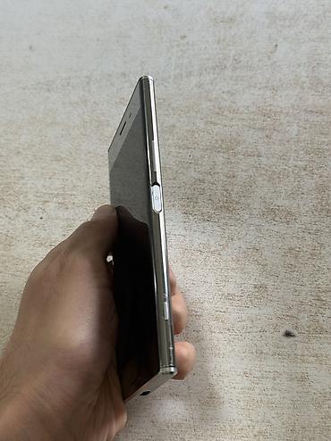 ош телефон бу: Sony Xperia Xz Premium, Б/у, 64 ГБ, цвет - Серебристый, 1 SIM — 5